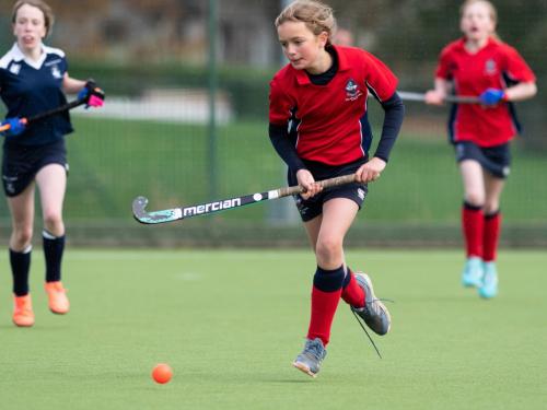 MES Girl Playing Hockey