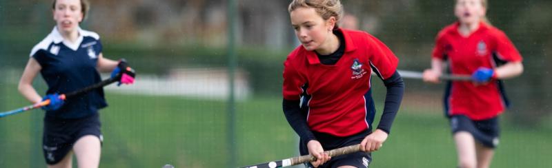 MES Girl Playing Hockey